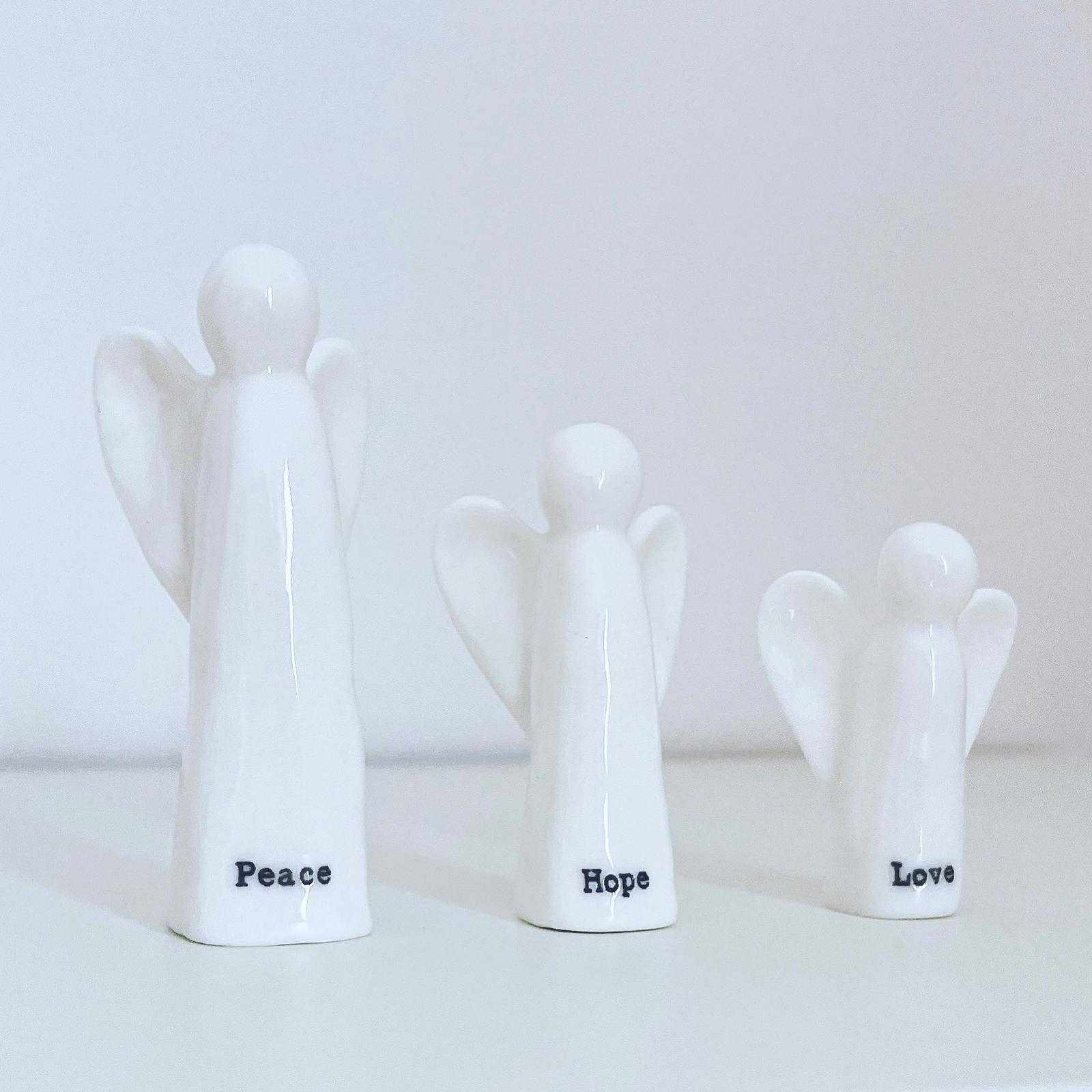 East Of India Porcelain Angels. Three Angels.