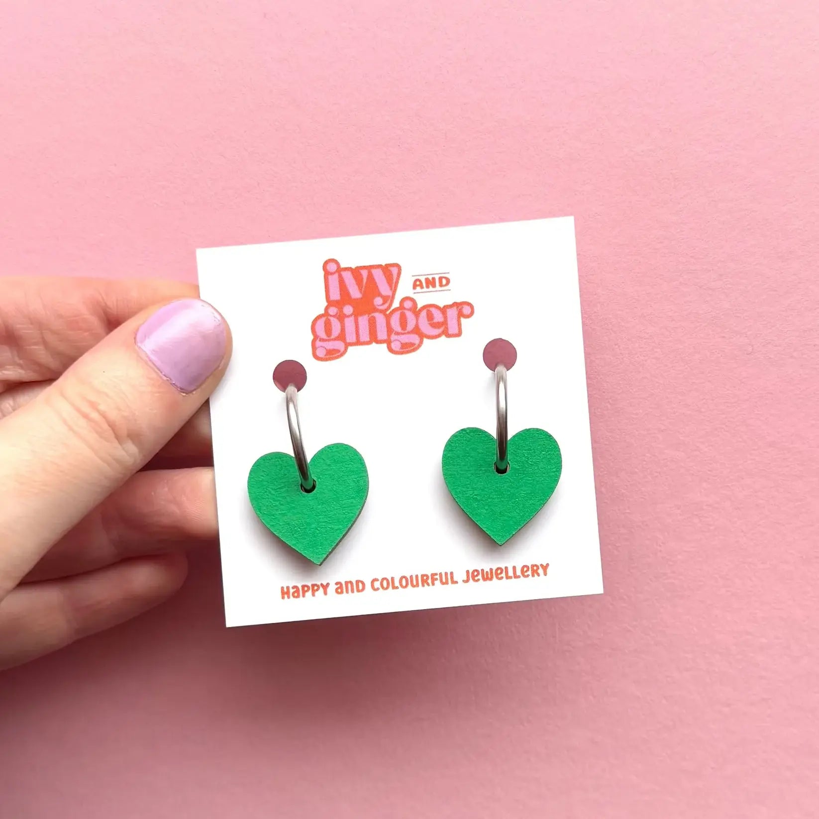 Green heart shaped statement valentines hoop earrings