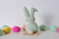 Green and Brown Rabbit on wooden base